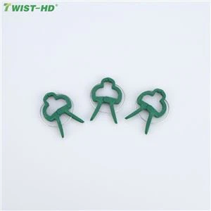 Закріплення квітки рослинним садовим кліпом